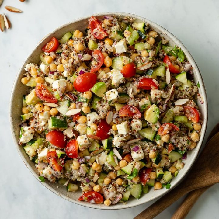 Quinoa, chickpeas, cucumber, avocado and coriander, served in a bowl