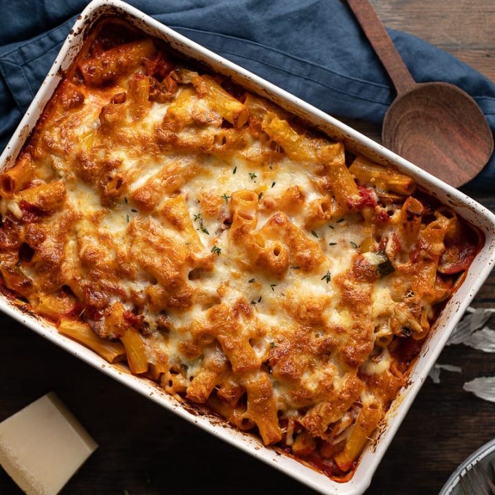 Pasta with courgette and tomato with cheese topping
