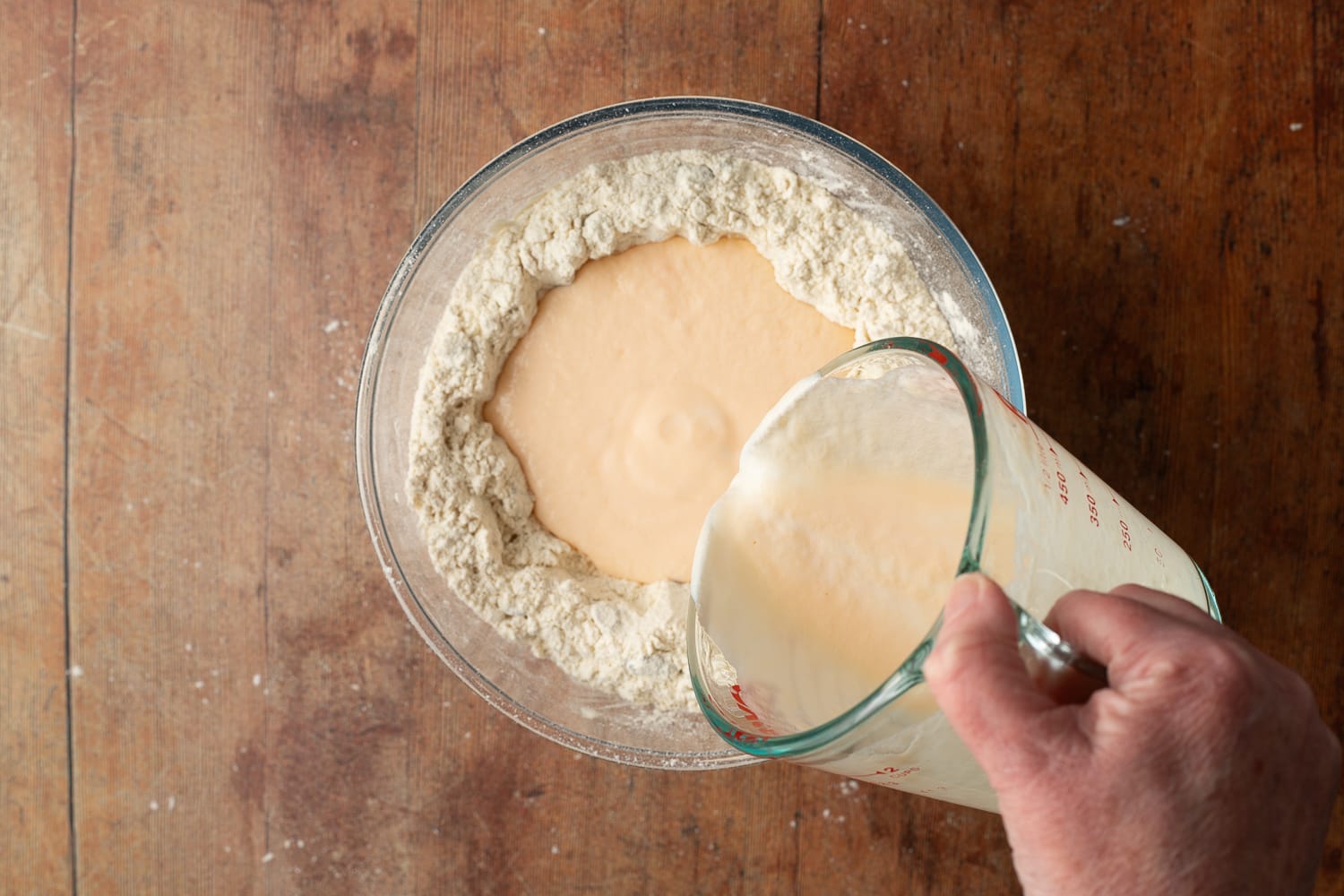 Egg mixture poured onto plain flour